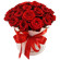 красные розы в шляпной коробке. Франция